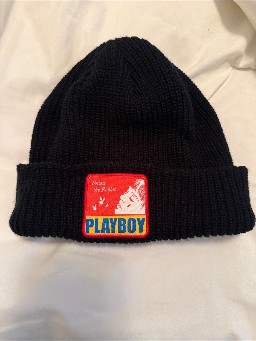 Black Playboy beanie.